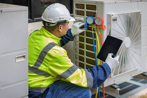 Professional Heat Pump Repair technician working in Avon, NC